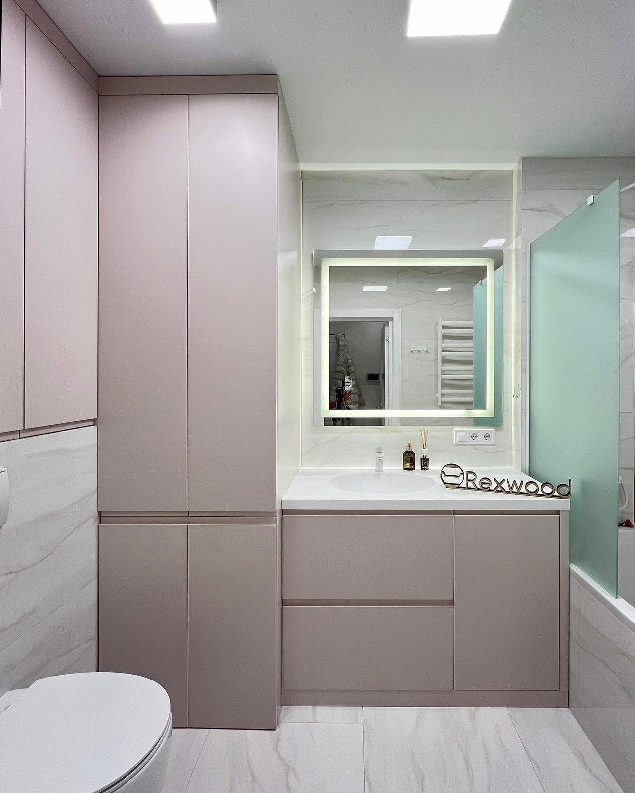 Blush Bathroom with Concealed Laundry & Boiler