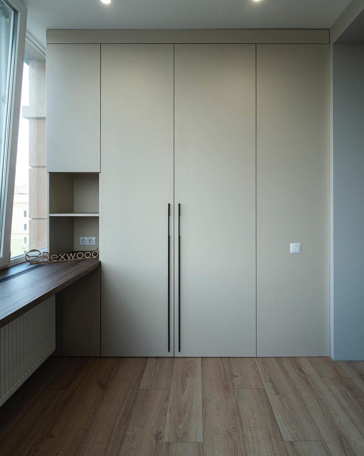 Balcony Study with Window Desk, Handleless Wardrobe & Hidden Storage