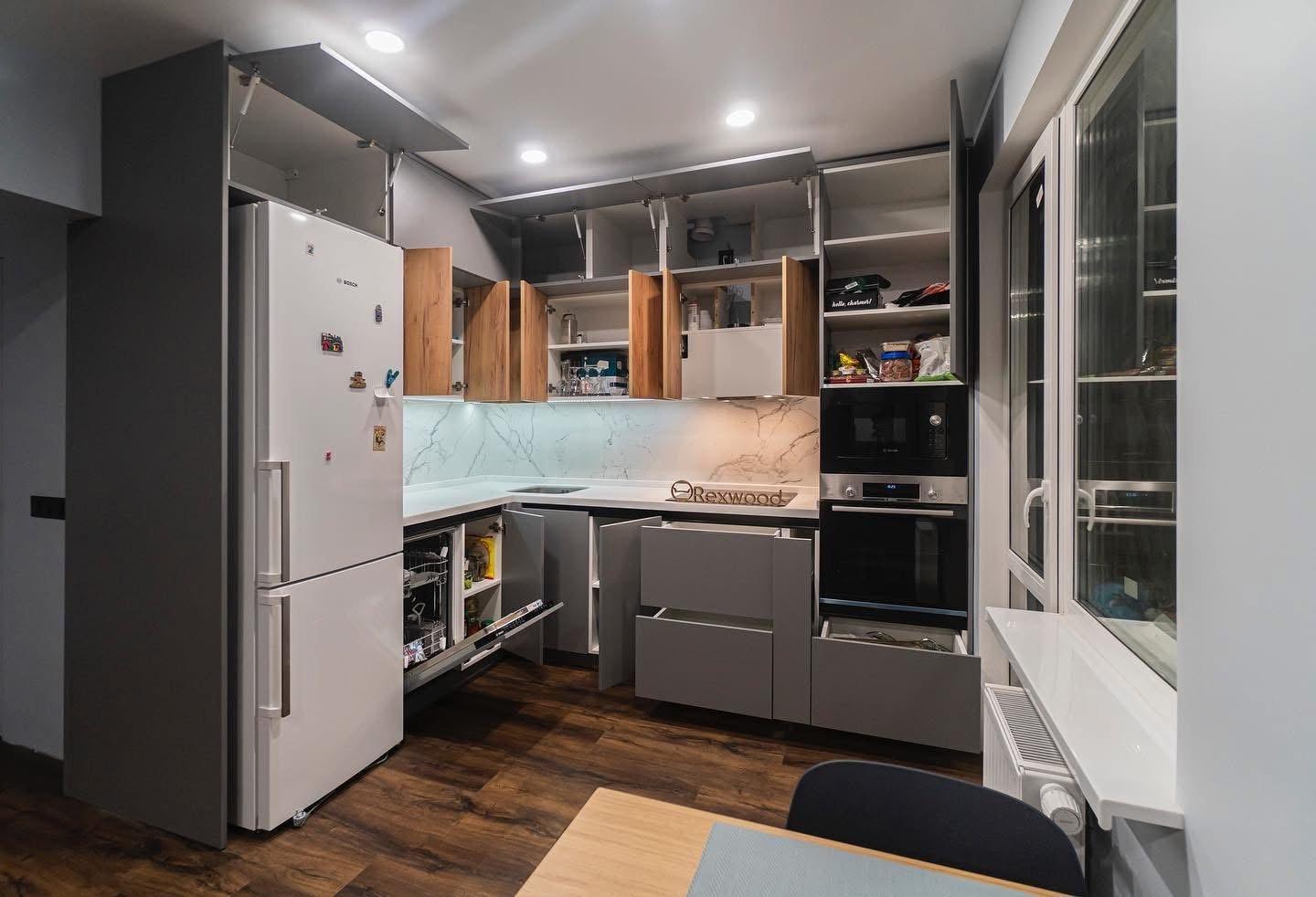 Grey & Oak Handleless L-Shaped Kitchen with White Solid-Surface Worktop — 9