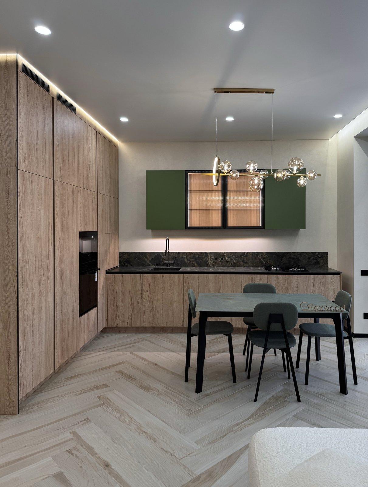 Oak Kitchen with Green Fluted-Glass Cabinets