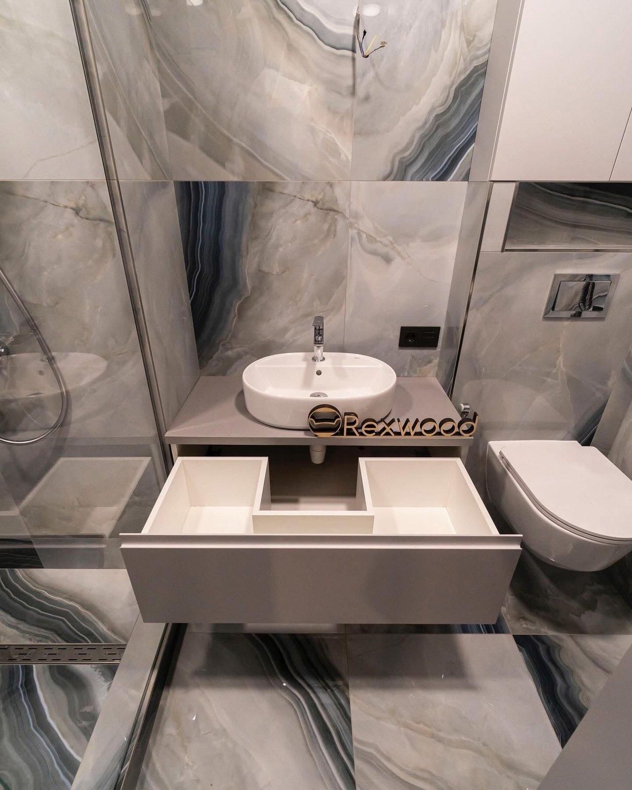 Compact Bathroom with Concealed Water Heater & Storage — 3