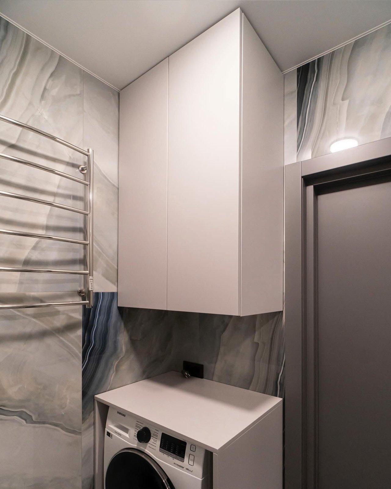 Compact Bathroom with Concealed Water Heater & Storage — 6