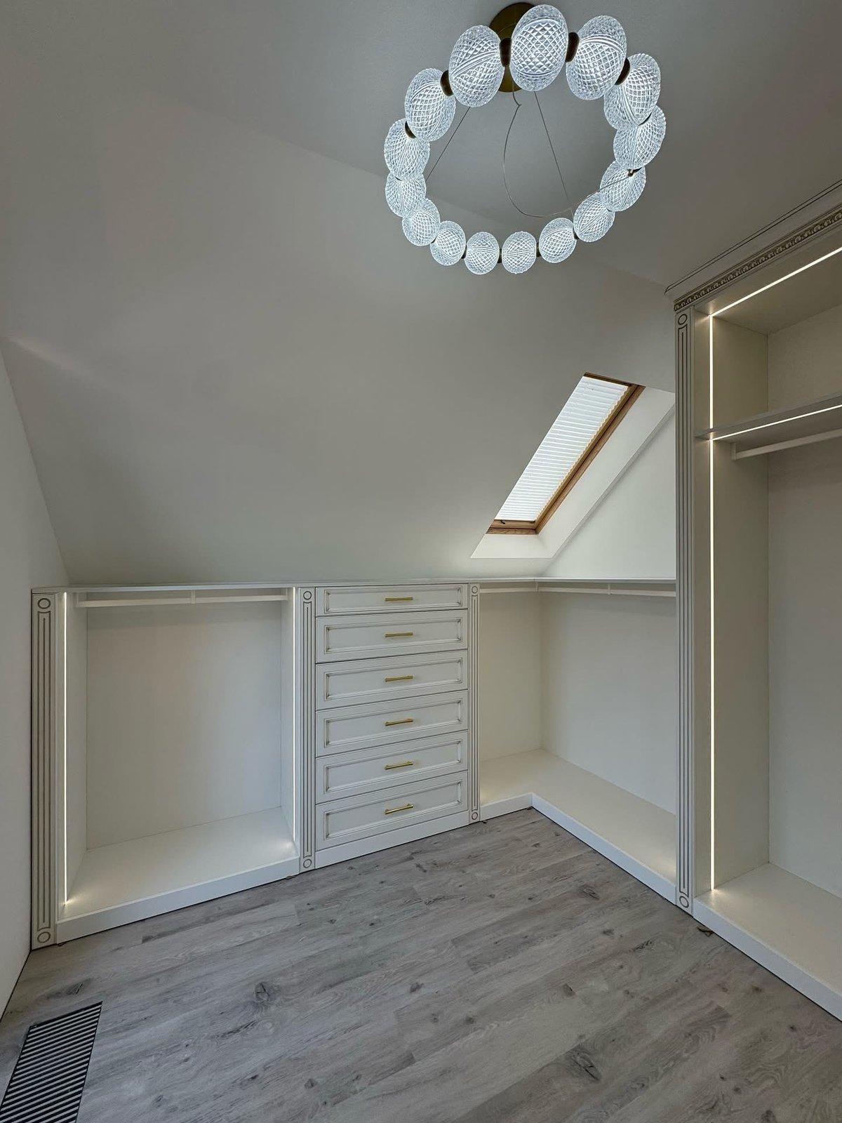 Attic Walk-in Closet with Integrated Lighting