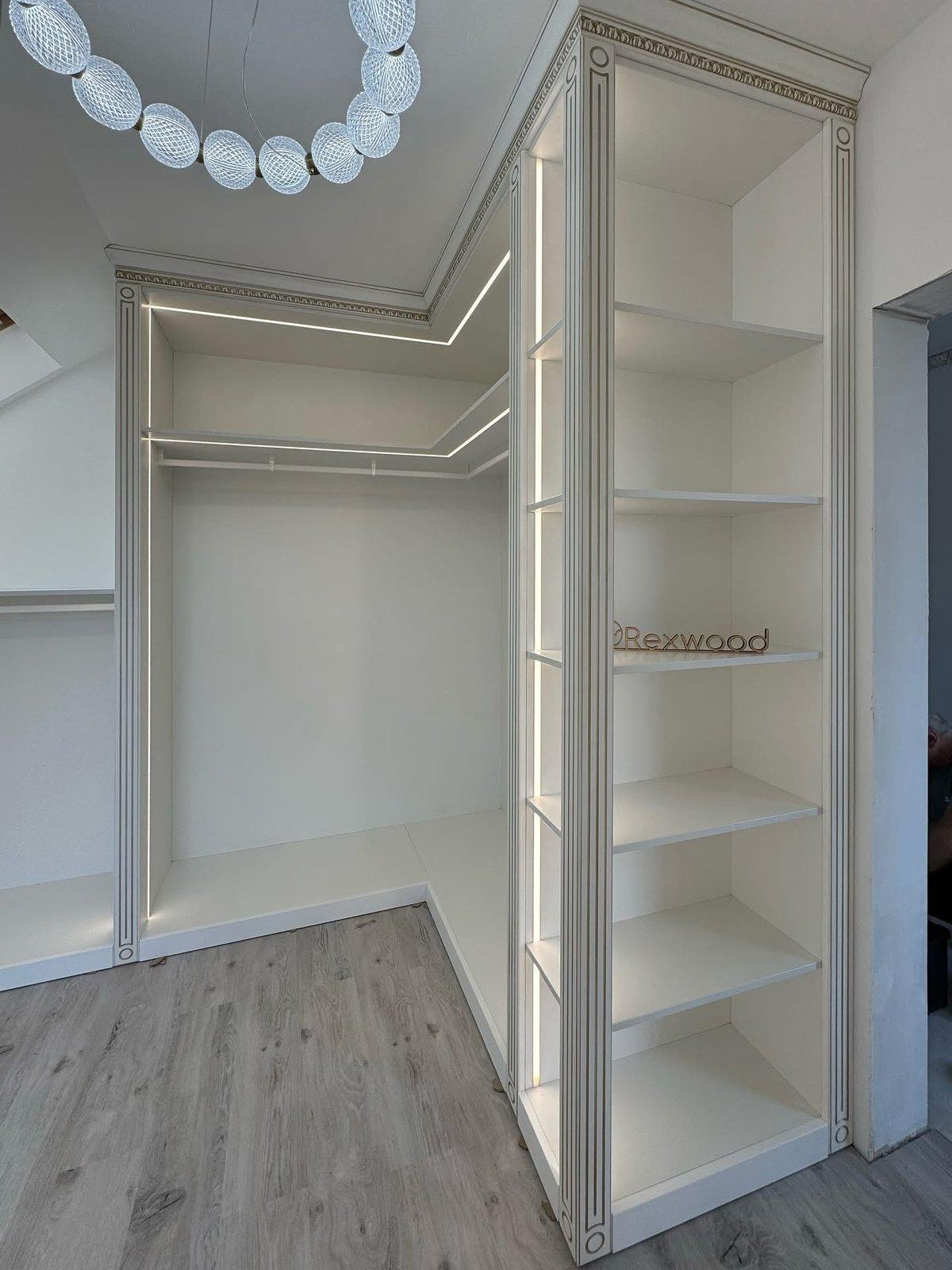 Attic Walk-in Closet with Integrated Lighting — 4