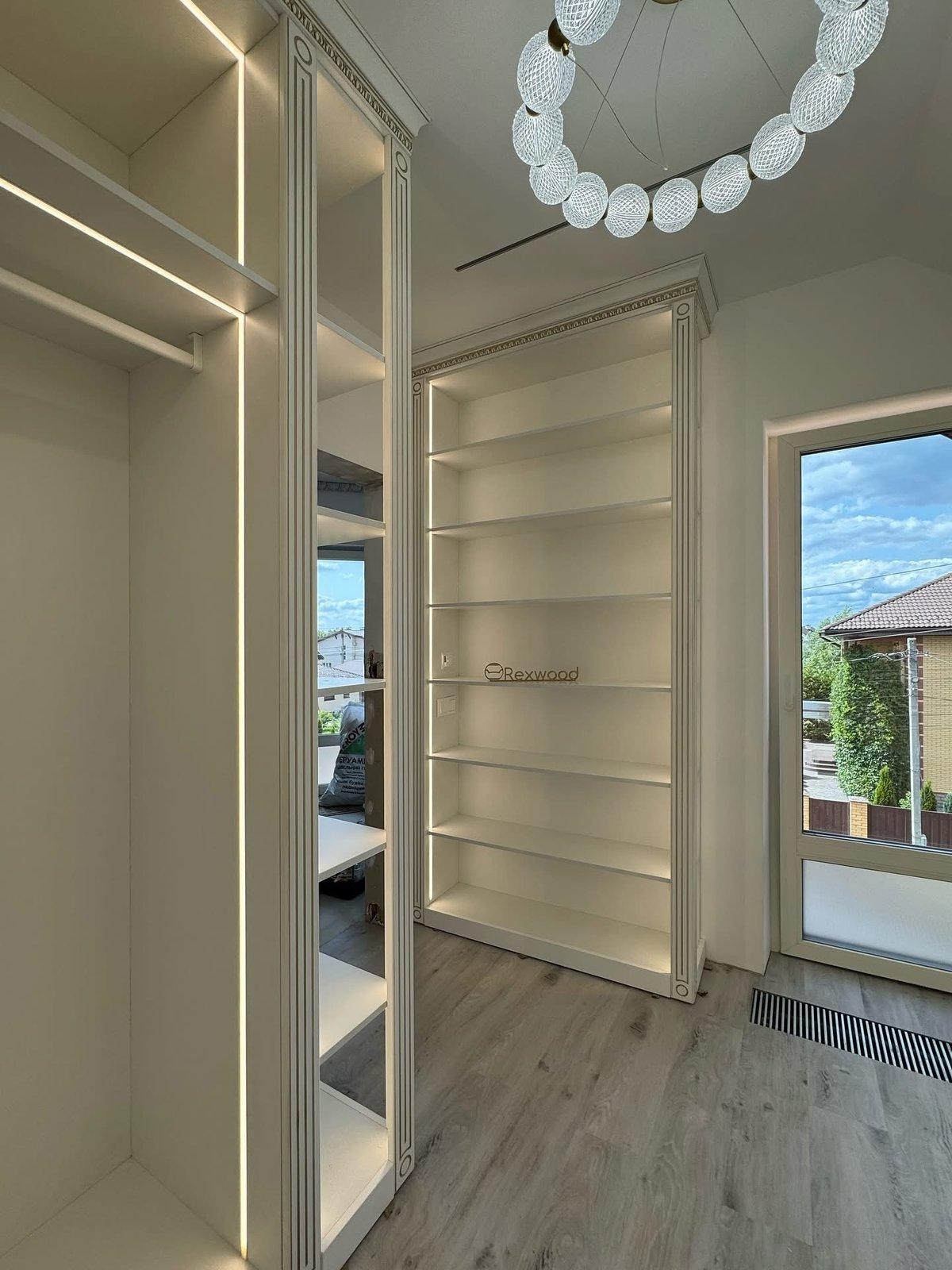 Attic Walk-in Closet with Integrated Lighting — 5