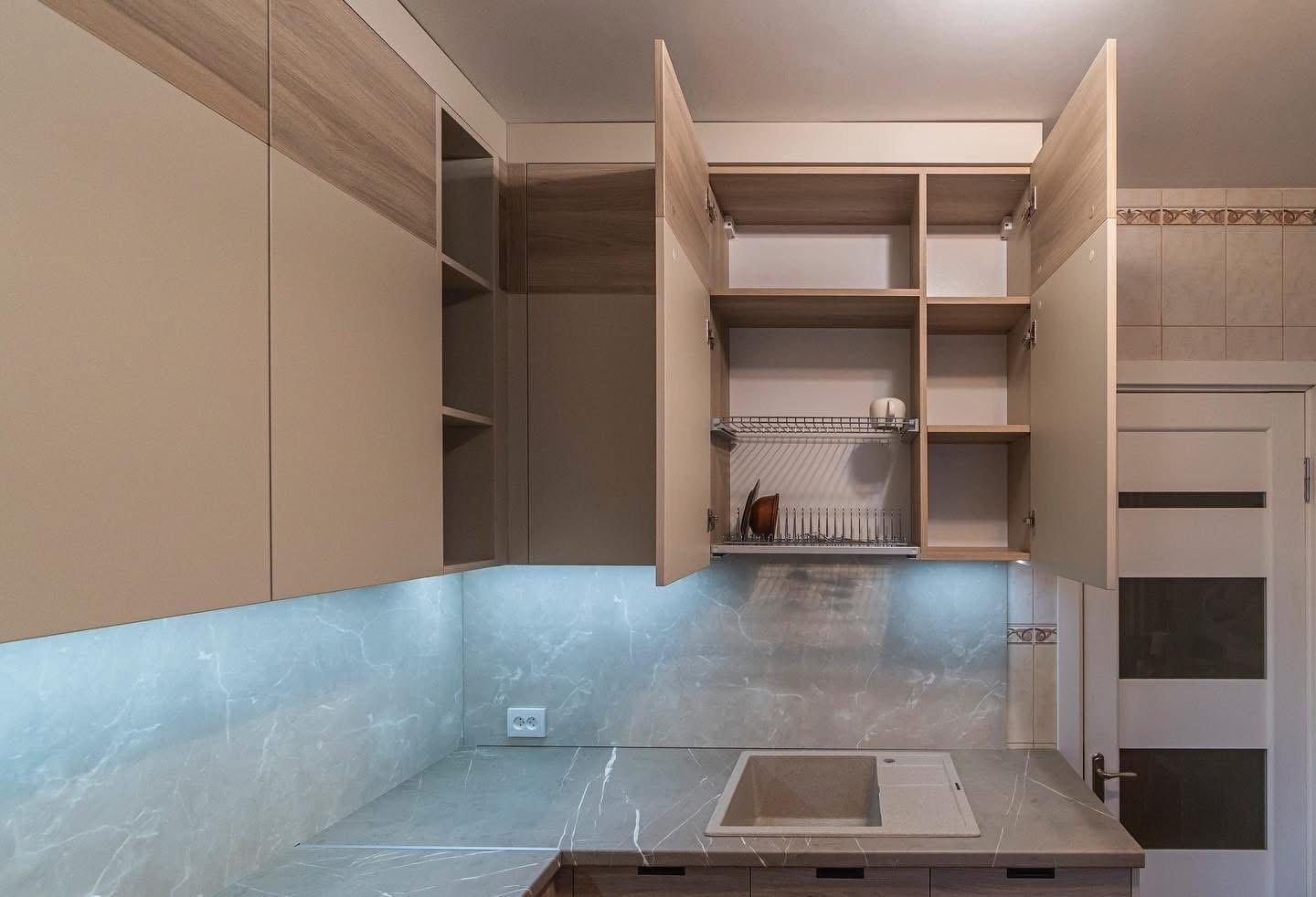 Beige & Woodgrain U-Shaped Kitchen with Grey Marble-Effect Worktop — 5
