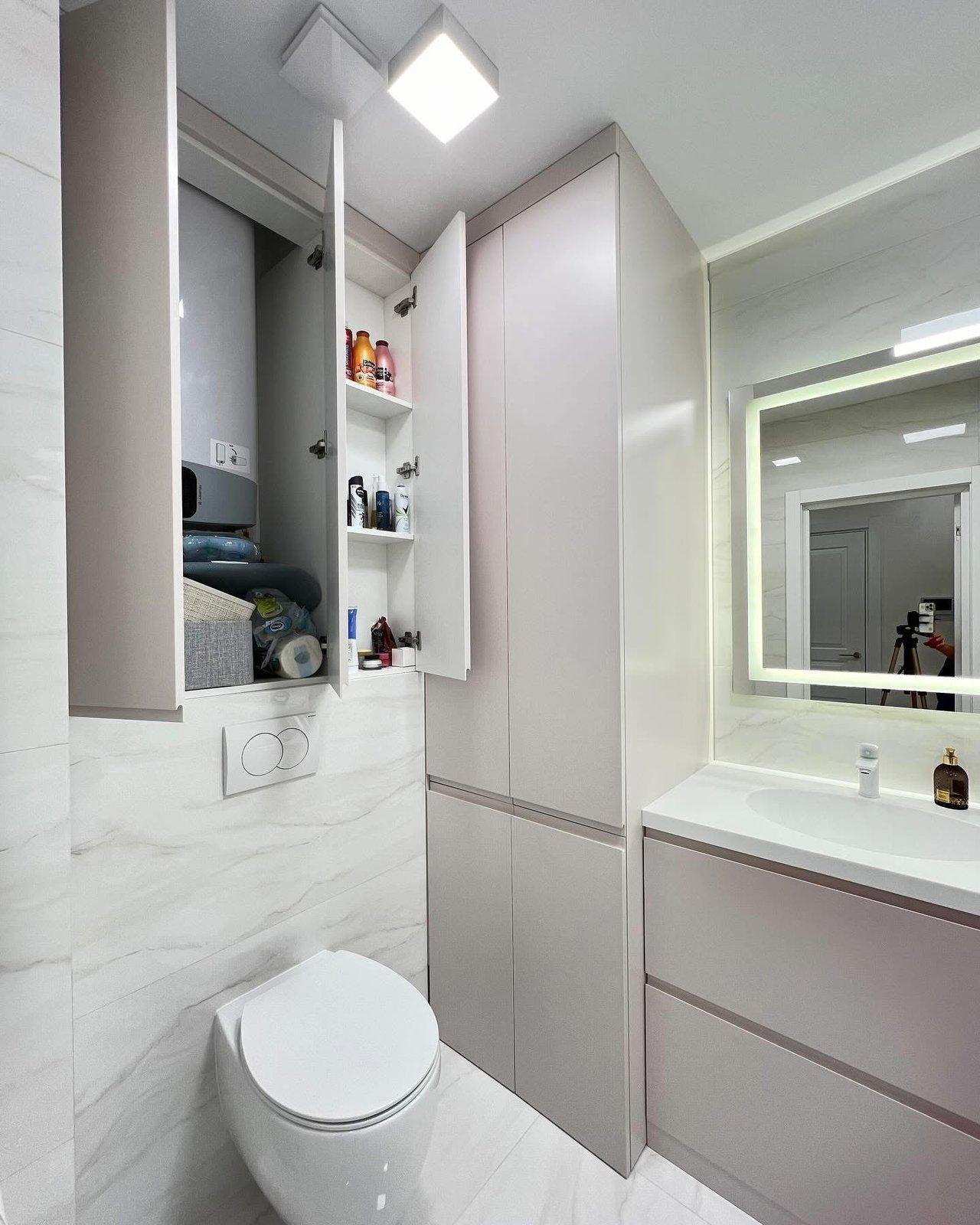 Blush Bathroom with Concealed Laundry & Boiler — 4