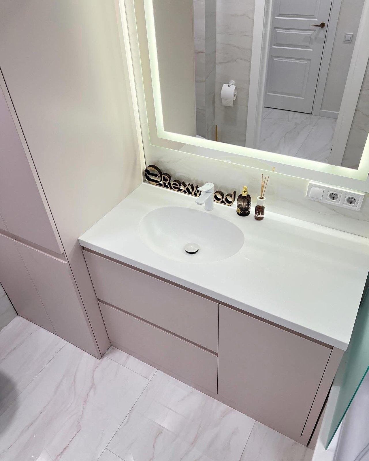 Blush Bathroom with Concealed Laundry & Boiler — 5