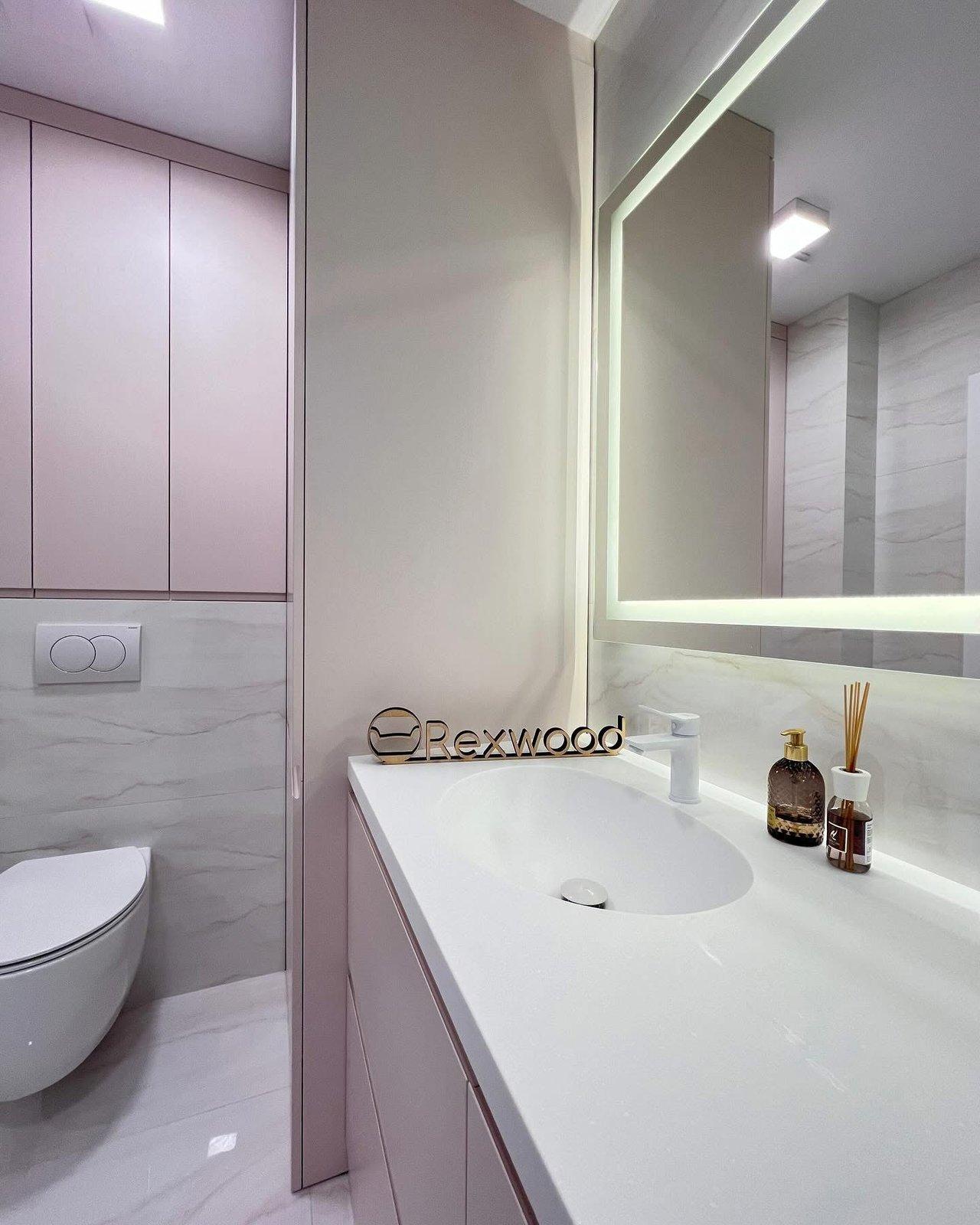 Blush Bathroom with Concealed Laundry & Boiler — 6