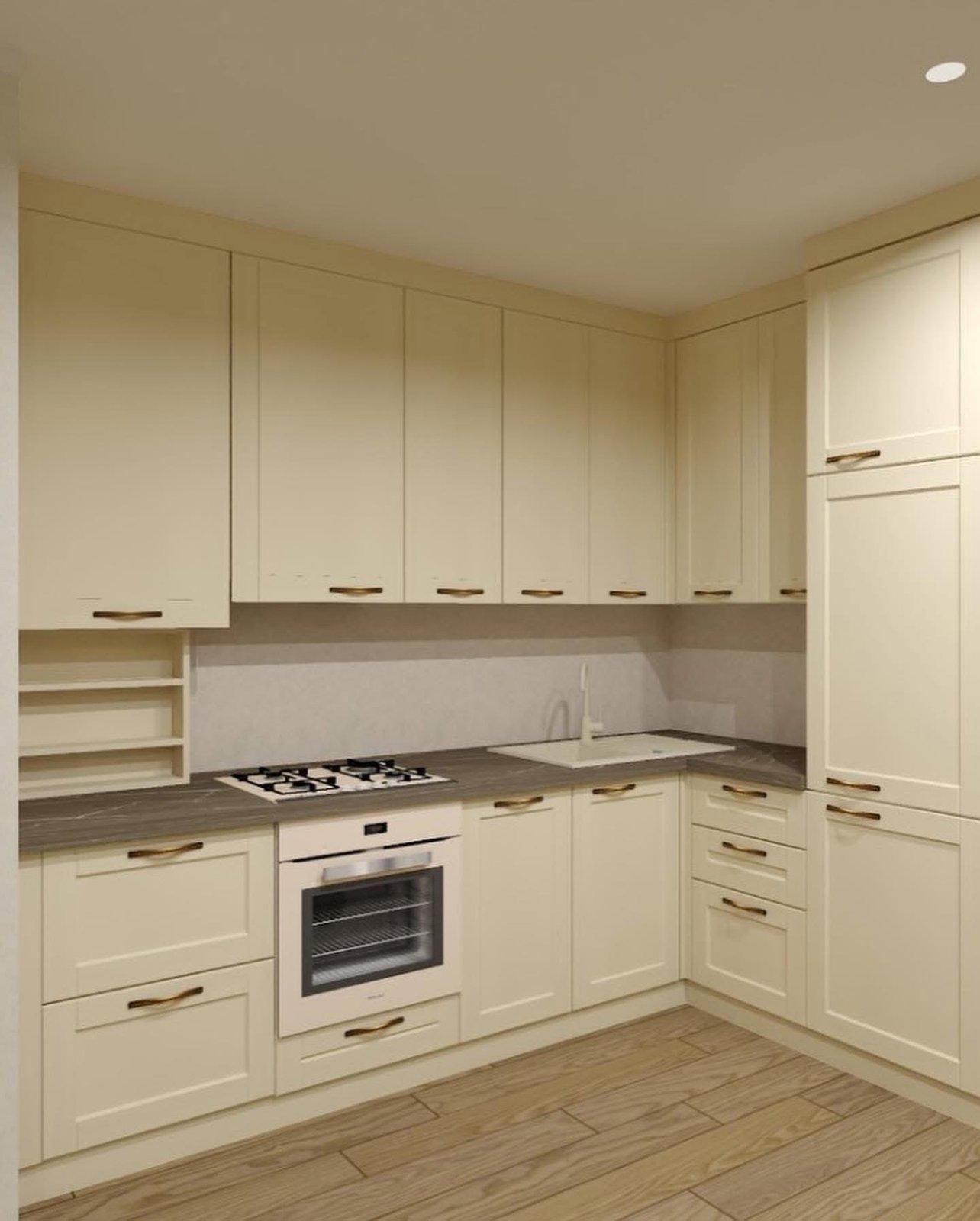 Cremefarbene Landhaus-L-Küche mit dunkler Arbeitsplatte in Marmoroptik — 7