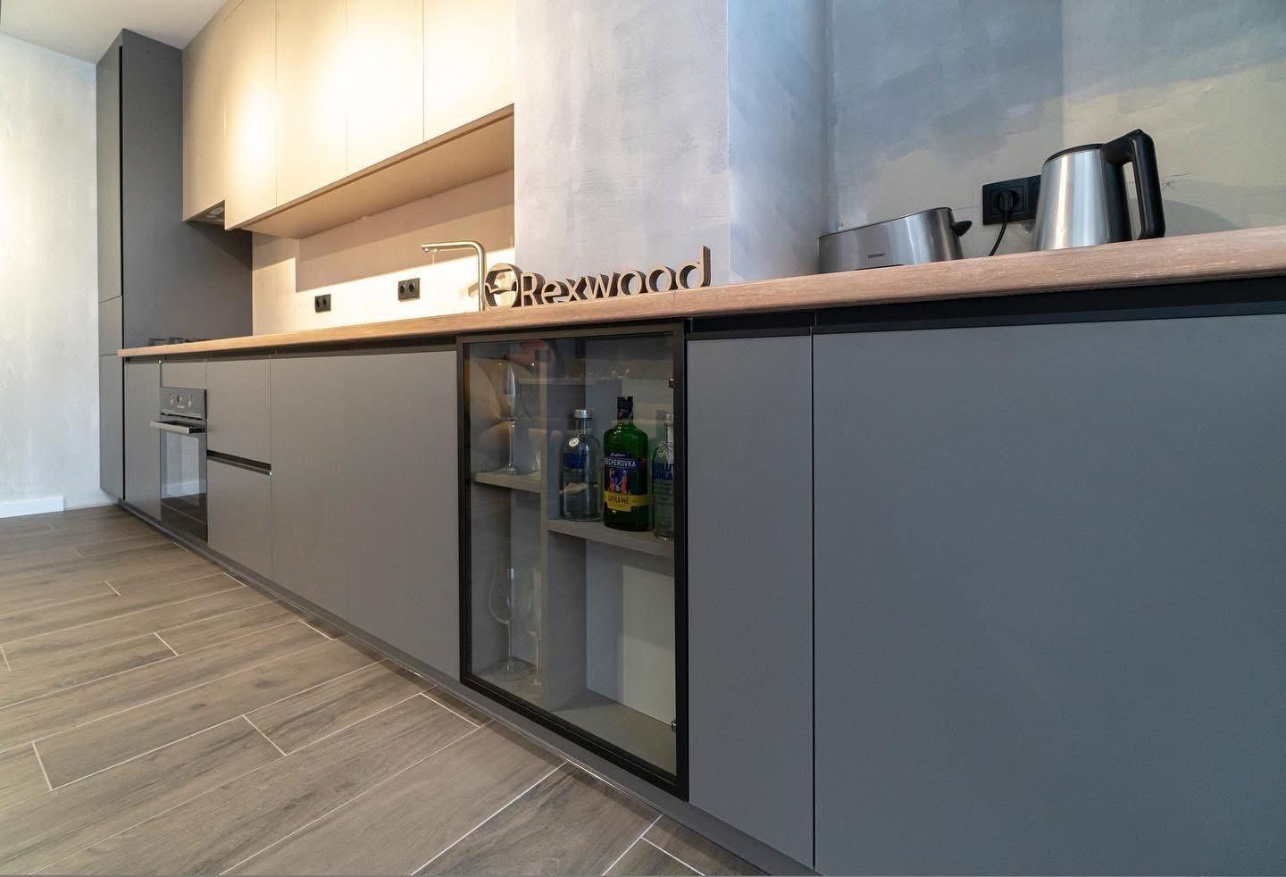 Graphite & Greige Single-Wall Kitchen with Glass-Fronted Bar Cabinet — 5