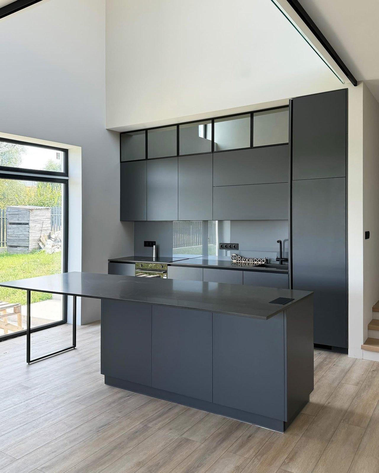 Graphite Kitchen in a Double-Height Space