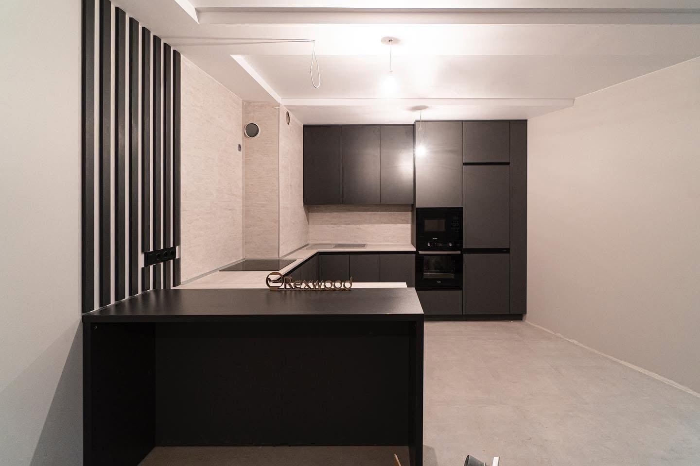 Graphite U-Shaped Kitchen with Raised Black Bar — 2