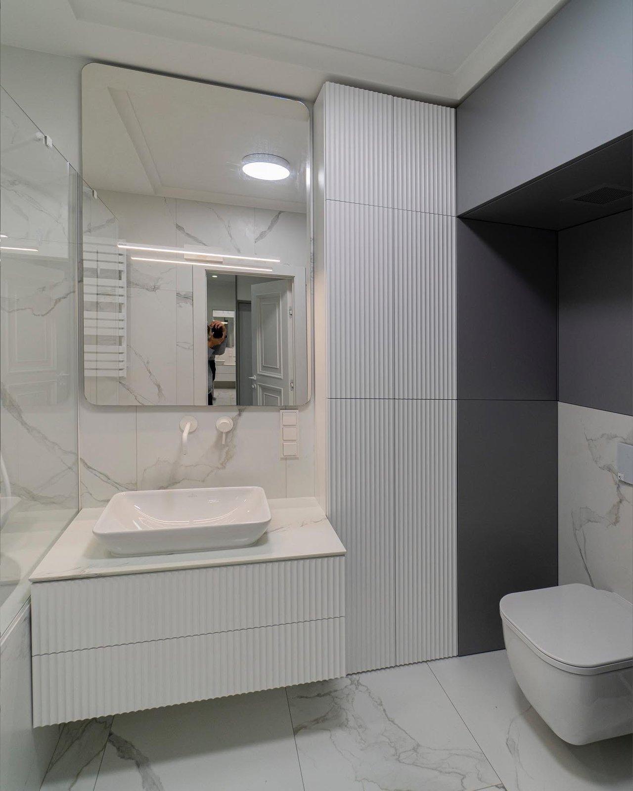 Bathroom with Concealed Laundry
