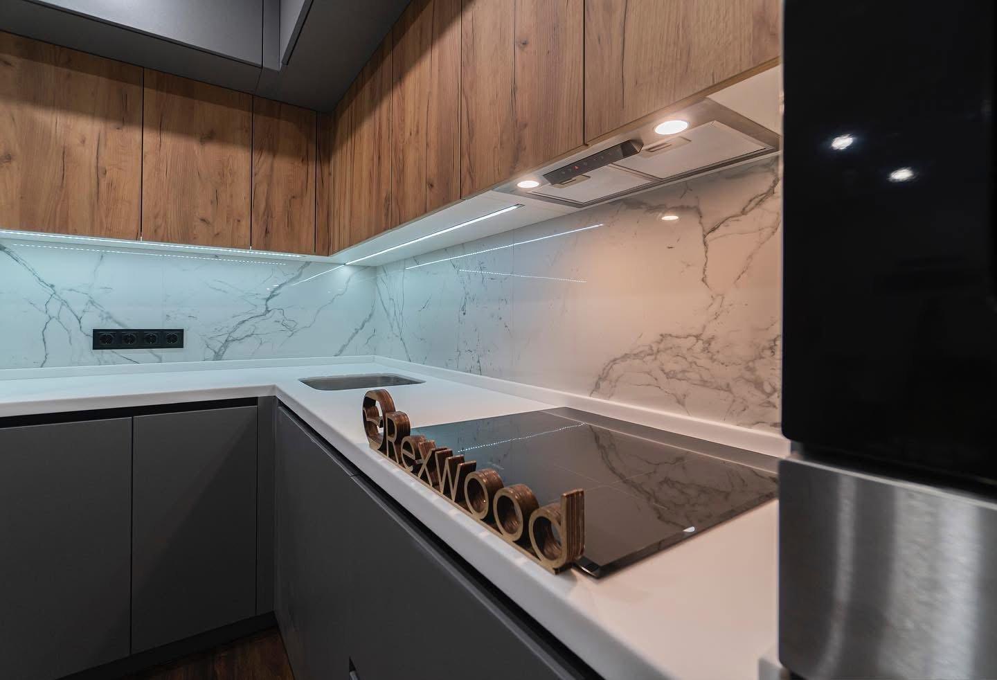 Grey & Oak Handleless L-Shaped Kitchen with White Solid-Surface Worktop — 4