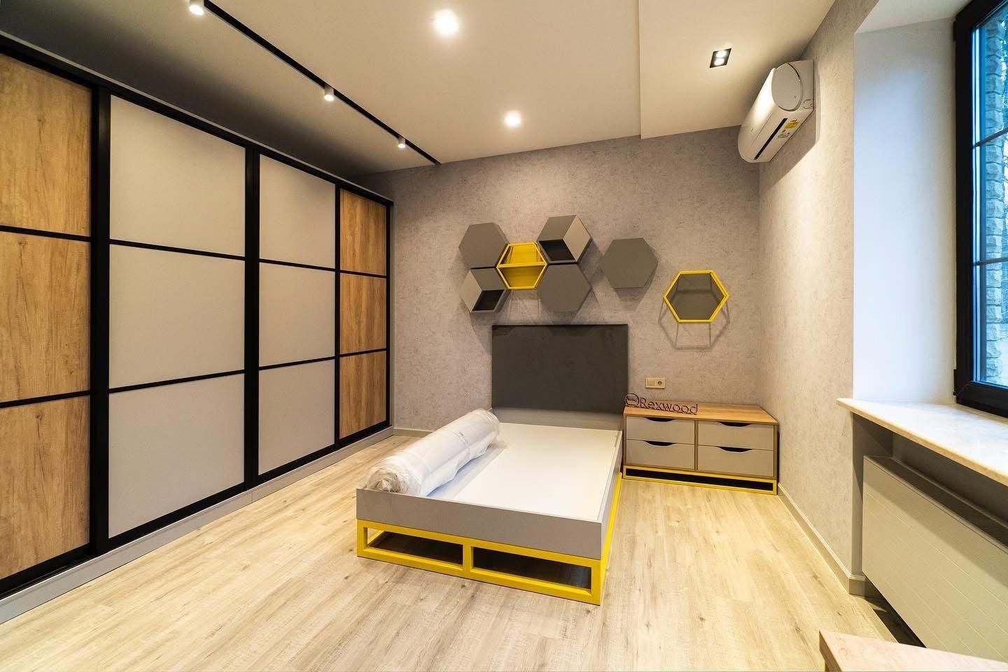 Grey & Oak Bedroom with Yellow Steel Accents