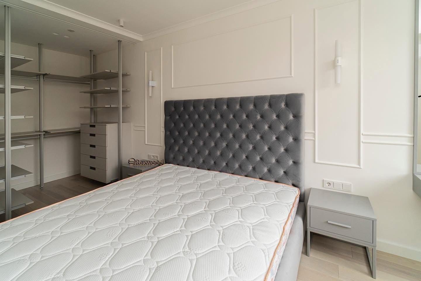 Bedroom with Tufted Headboard