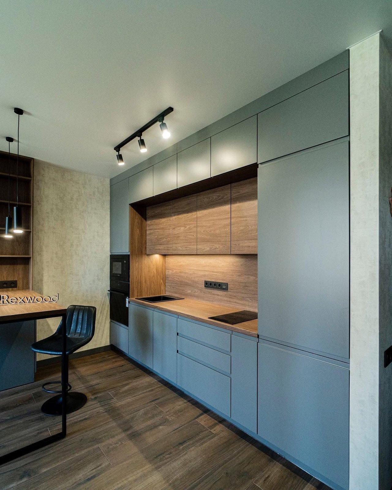 Grey Kitchen with Wood Niche & Bar Table — 3