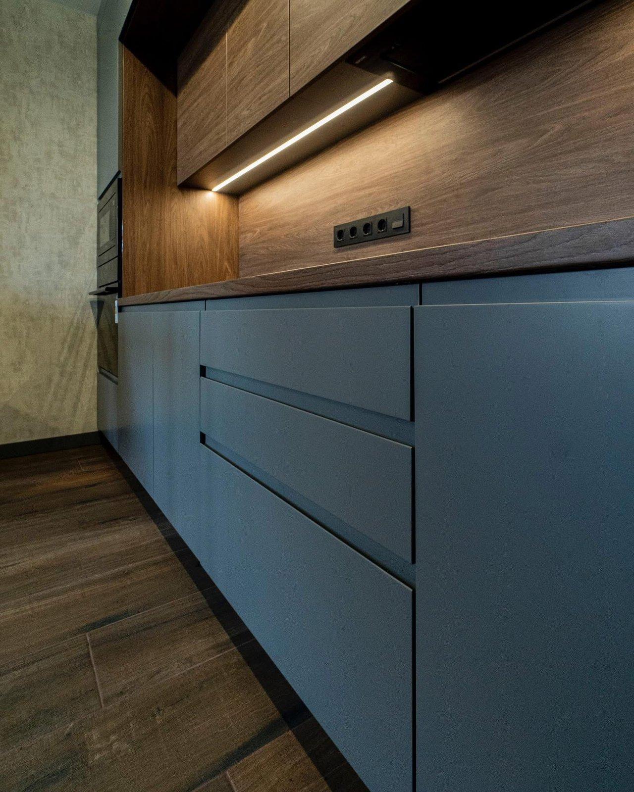 Grey Kitchen with Wood Niche & Bar Table — 7