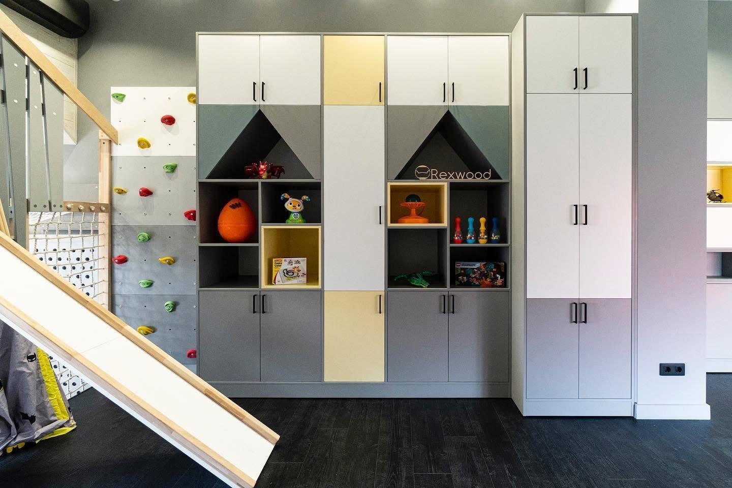 Attic Playroom with House-Shaped Shelving — 2