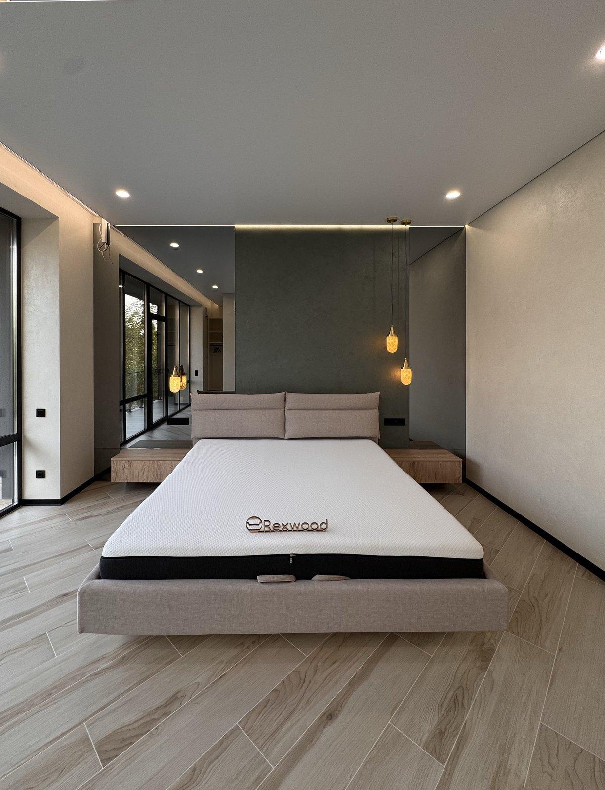 Bedroom with Floating Bed & Oak Units