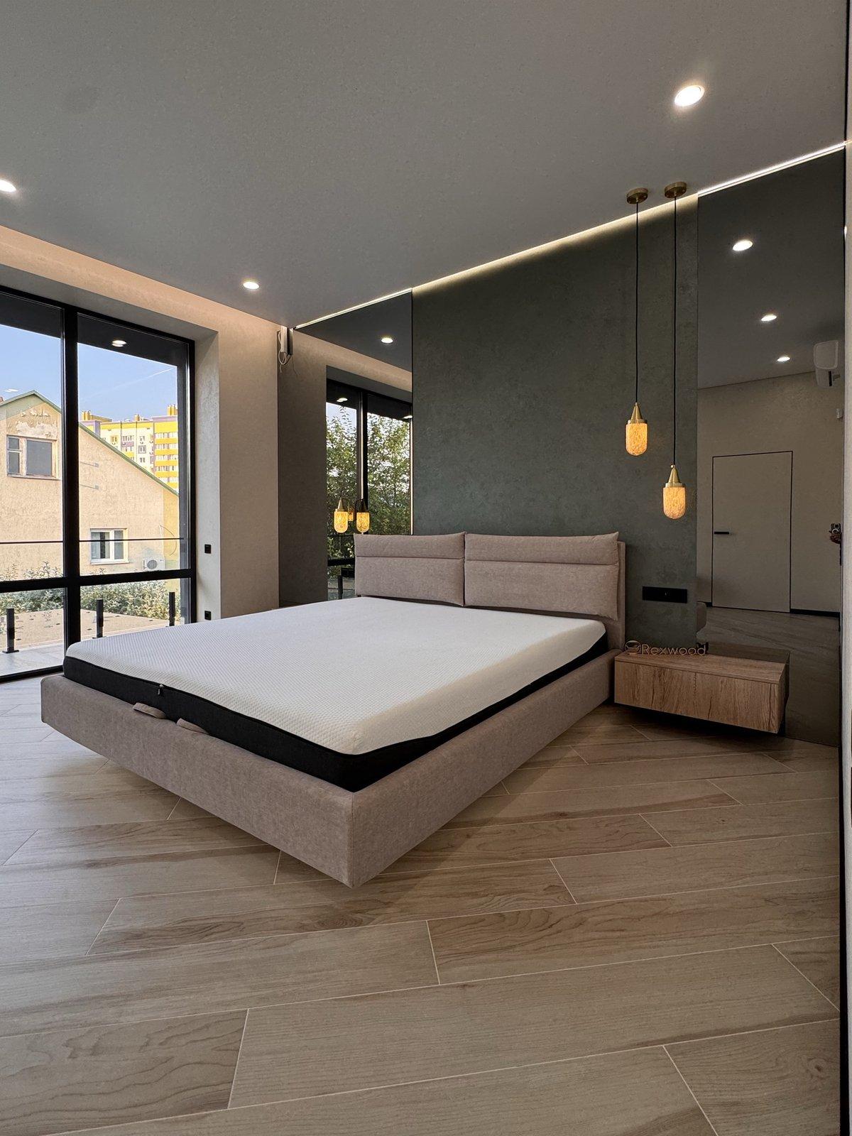 Bedroom with Floating Bed & Oak Units — 2