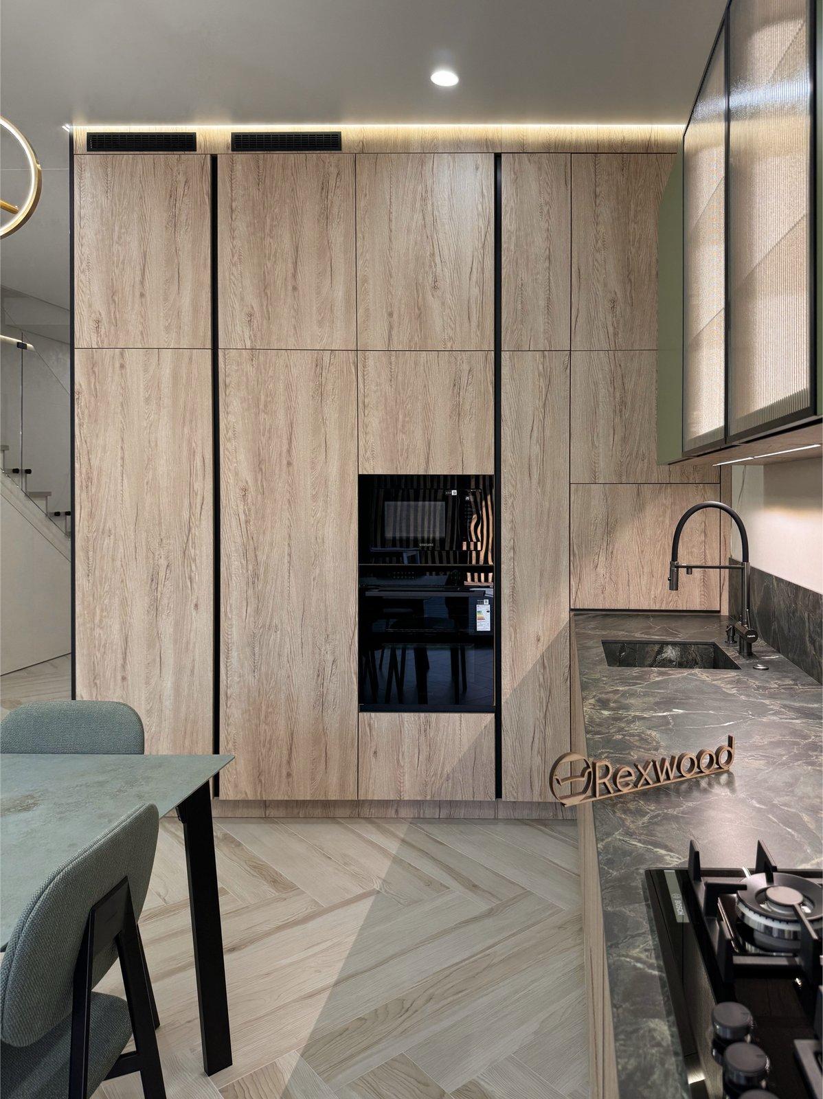 Oak Kitchen with Green Fluted-Glass Cabinets — 5