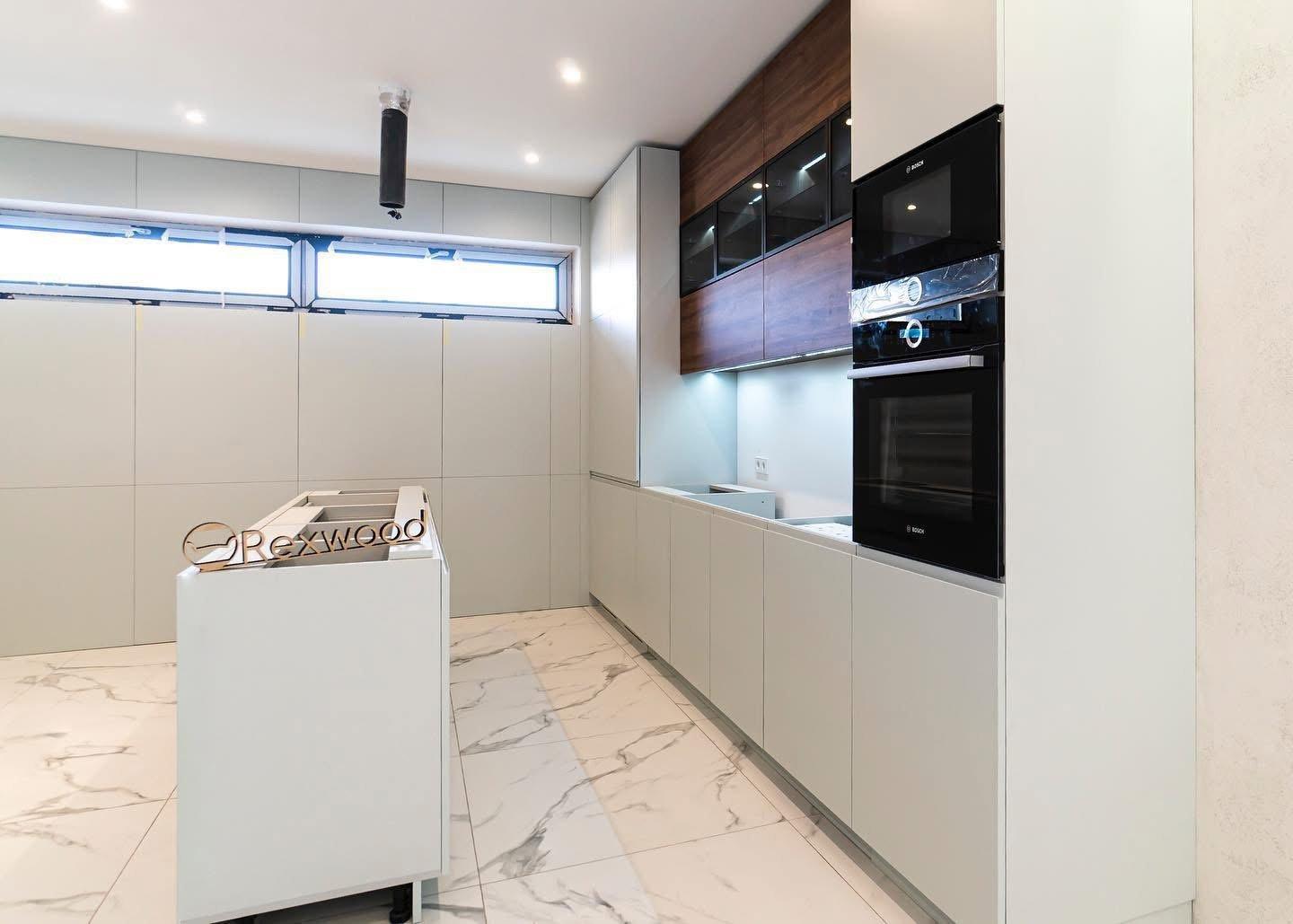 Sage & Walnut Kitchen with Perforated Island Panel — 7