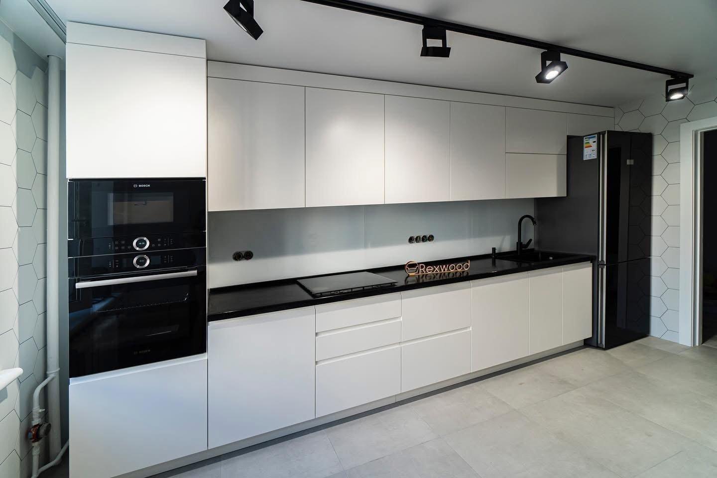 White Handleless Single-Wall Kitchen with Black Worktop