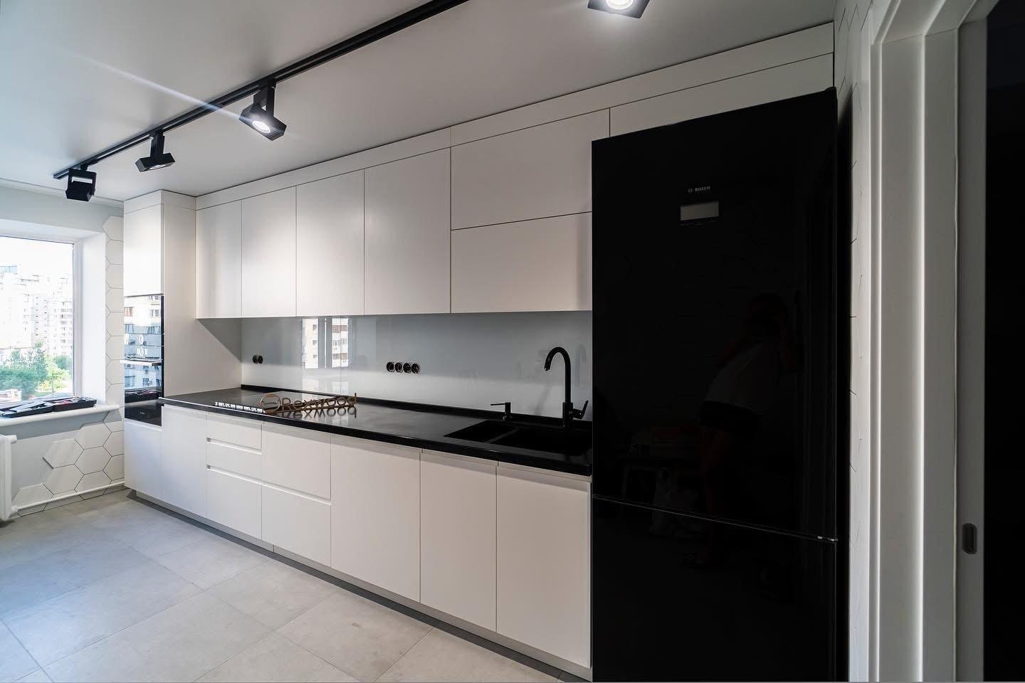 White Handleless Single-Wall Kitchen with Black Worktop — 2