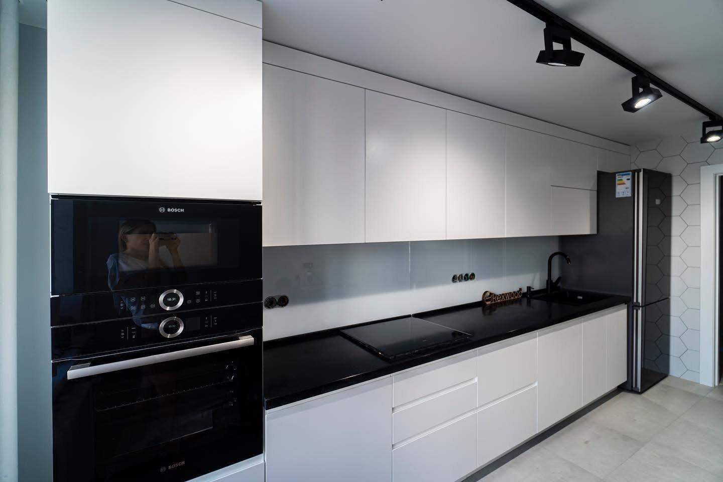 White Handleless Single-Wall Kitchen with Black Worktop — 3