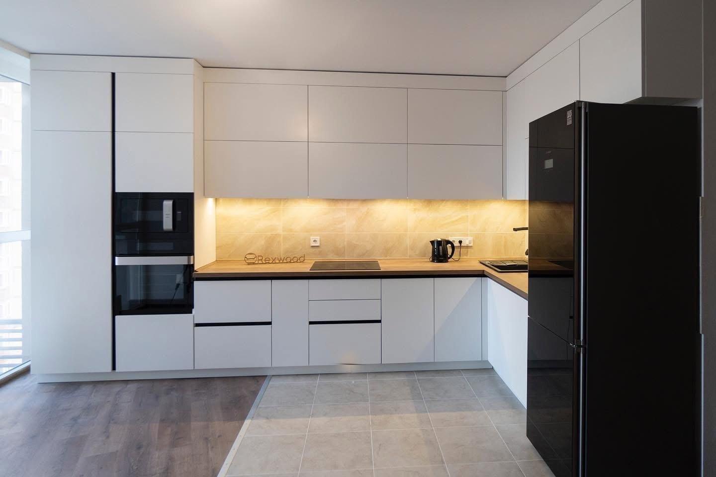 White Handleless Kitchen with Oak Worktop