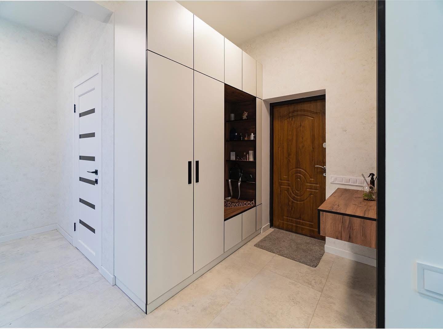 White Entryway Wardrobe with Oak Slat Wall & Floating Console